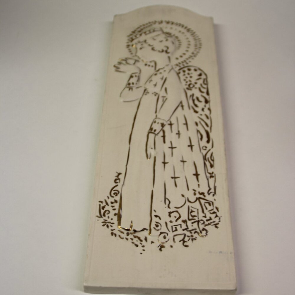 vintage religious ceramic wall hanging disciple holding a dove gold and cream